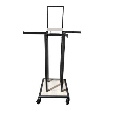 China Steel+Wood 4 Way Floor Garment Display Rack Free Standing Metal Clothing Rack for sale