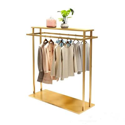 China Art Design Durable Minimal Double Side Clothing Display Clothes Gold Metal Display Rack for sale