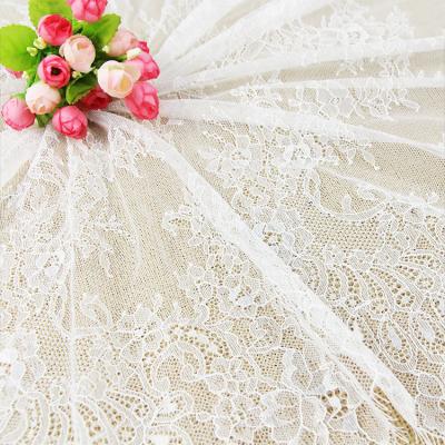 China Good elastic white stretch lace for bridal dress, wholesale elastic spandex lace for garment lace fabric for sale