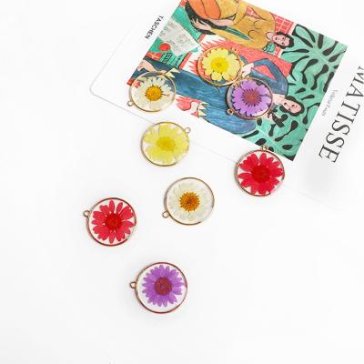 China Acrylic alloy dry flower resin sealed small real flower pendant earrings necklace handmade diy material bracelet for sale