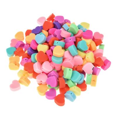 China 1000pcs/bag Wholesale Ceramic Loose Vinyl Solid Color Polymer Clay Black Stone Beads Heart Love Hearts For Jewelry Making for sale