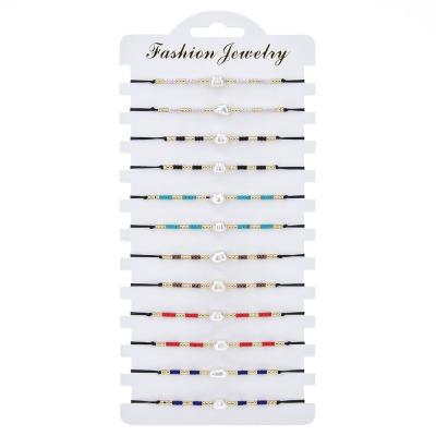 China 12pcs/card Pure Handmade Adjustable Woven BOHEMIA Seed Beads Baroque Freshwater Pearl Bracelet for sale