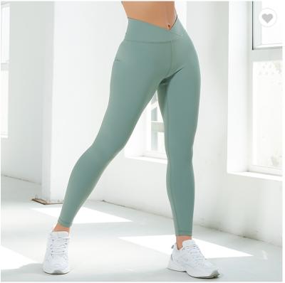 China Cross Waist Outdoor Jogging Skinny Comfortable Women's Breathable Yoga Leggings With Custom LOGO for sale