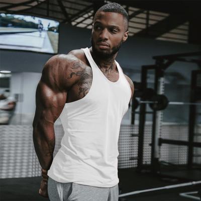 China QUICK DRY men's summer fitness sports vest gym sports cotton solid color muscle wide shoulder I-shaped vest for sale