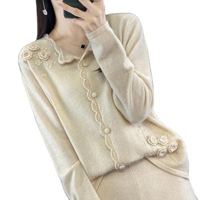 China Anti-wrinkle ladies lace up round neck three-dimensional hand crocheted sweater autumn and winter new cashmere knitted loose bottoming shirt top for sale