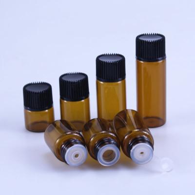 China Mini Bottle 1ml 2ml 3ml 5ml Small Glass Vials Eco-friendly Recyclable Empty Amber Essential Oil Bottle With Inner Cover And Plastic Screw Cap for sale