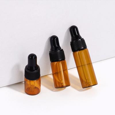 China Eco-friendly Mini Amber 2ml 5ml 3ml 1ml Vial Small Blue Clear Glass Bottles Perfume Sample Vials For Essential Oil With Dropper Cap for sale