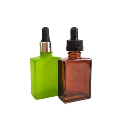 China 15ml 30ml 50ml 100ml Square Eco-friendly Clear Frosted Design New Dropper Flat Glass Bottle Perfume Oil Bottle For Cosmetic Essential Oil for sale