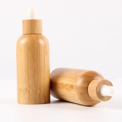 China Wholesale Eco-Friendly Recyclable Eco-Friendly Low MOQ Mini Packaging Bamboo Sets 30ml Bamboo Dropper Empty Glass Bottle Amber Color for sale