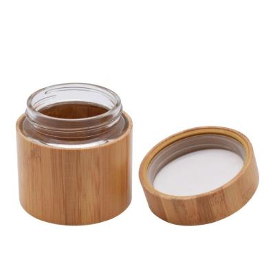 China OEM 30ml 50ml Bamboo Lid Face Cream Container Glass Cream Jar Eco-friendly Cosmetics Glass Packaging Jar Skin Care Cream Jar With Bamboo Lids for sale