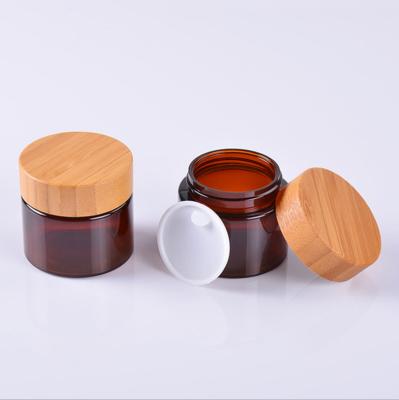 China Eco-friendly Material Body Scrub Cosmetic Container 50g 100g 150g 200g 250g Frosted Amber Clear PET Plastic Jar With Bamboo Wooden Cap for sale