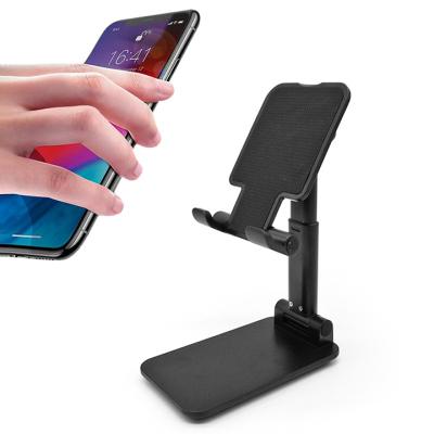 China Foldable Portable Support Cell Phone Stand Gravity Phone and Tablet Desktop Stand for sale