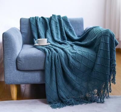 China PORTABLE Wholesale New Design Amazon Soft Lightweight Comfortable Throw Blanket For Couch Sofa Bed Decorative Knitted Blanket With Tassels for sale