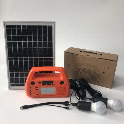 China Home Use 15W Home Use Panel Portable Power Solar Lighting System Kit with Solar Panel, Radio, Learning Lamp for sale