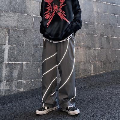 China anti-wrinkle 2020 high street men's and women's anti-wrinkle pants men's and women's hip irregular reflective hip hop Korean trend institute statistics sports casual pants for sale