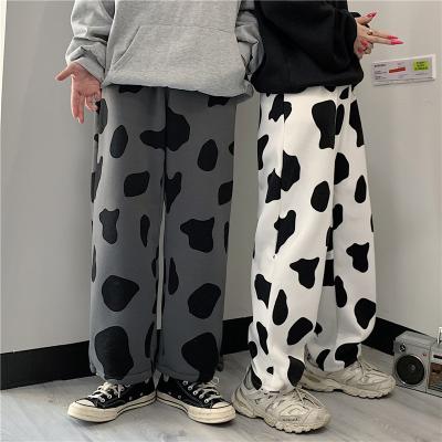 China Korean Trend Anti-wrinkle Anti-wrinkle Gaiters With Plush Thickening GOLD Men's And Women's Cow Print Casual Pants Loose And Wide Leg for sale