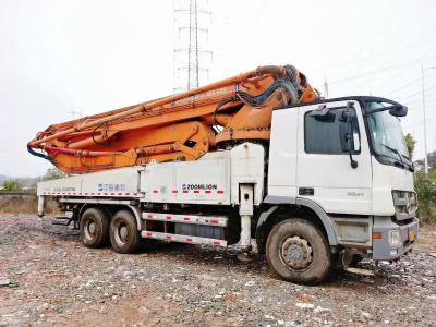 China Groene veilige werking mobiele betonpomptruck langdurige zware betonboompomptruck Te koop