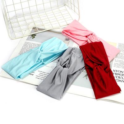 China Wholesale New Fashion Ladies Yoga Head Band Soft Solid Color Stretch Sports Headband Cross Hair Band High for sale