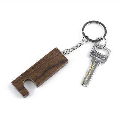 China China 2021 New Design Wooden Key Chain Phone Wooden Stand / Custom Logo Prop Keychain for sale