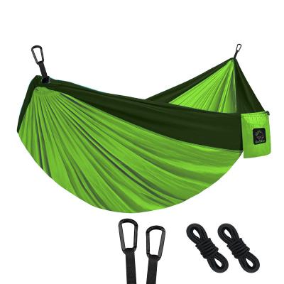 China 2021 light weight factory specializes in manufacturing nylon waterproof outdoor portable double yard camping anti violent hammock for sale