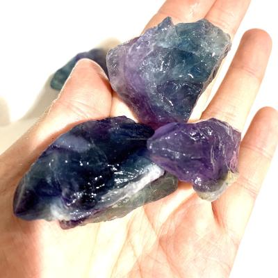 China Europe Rainbow High Quality Fluorite Raw Rock Healing Crystal Reiki Gemstone Gravel Stone for sale