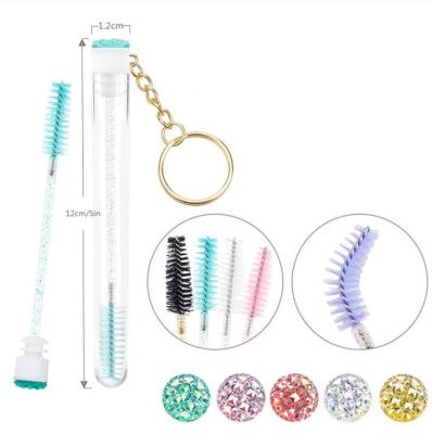 China Hot Selling Mini Eyelash Makeup Custom Logo Eye Lash Spoolies Cleaning Brush In Tube Keychain Mascara Eyelash Extension Brush Key Chain for sale