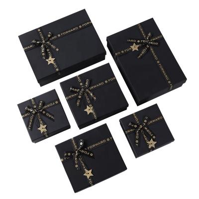 China New handmade high quality square luxury star printing ribbon gift packaging box for shoes wedding birthday for sale