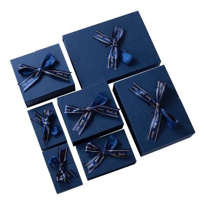 China Handmade Custom Luxury Blue Packaging Design Rigid Cardboard Paper Gift Boxes With Ribbon Lid for sale