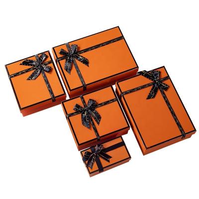 China Luxury Classic Customized Handmade Cardboard Paper Orange Gift Box With Ribbon for sale