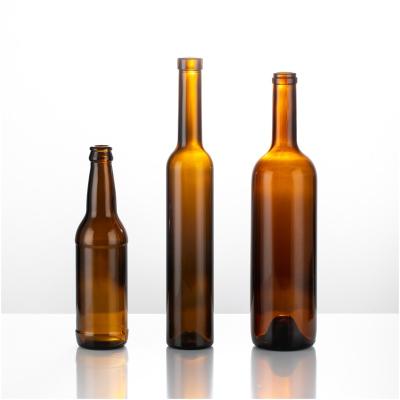 China Wine Champagne Sparkling Empty Bottles Packaging Wholesale Prices Colored Glass Wine Bottles for sale