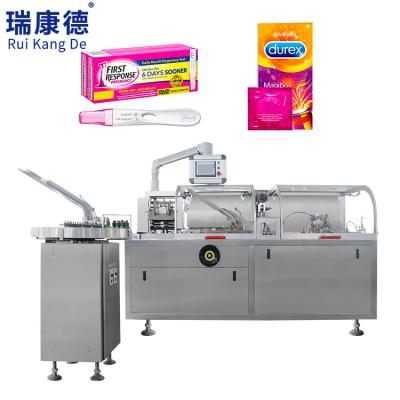 China Automatic Test Stick Pregnancy Packing Box Cardboard Food Condom Cartoning Packaging Machine for sale