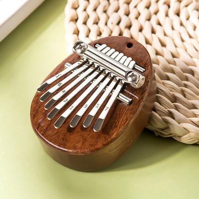 China Portable Mini Thumb Piano Music Enlightenment Finger Piano Great Gifts for Adults and Kids Beginners for sale