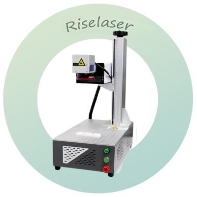 Китай 3w 5w УФ маркировочная машина портативная для ювелирных электронных деталей деревянный пластик продается
