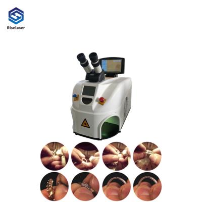 China Desktop Jewelry Gold 60W Mini Spot Laser Welding Machine for sale