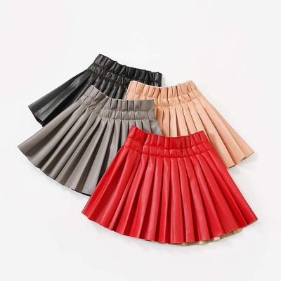 China Anti-wrinkle 2-15Years Babies PU Leather Skirt Baby Pleated Elastic Waist Short Solid Skirts Pleated Skirt for sale