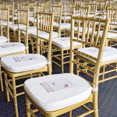 China Modern Wholesale acrylic metal stackable party chivari chiavari wedding chair with cushion for sale