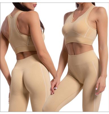 China Breathable Wholesale Body Train Simple Solid Seamless U Neck Jumpsuit Yoga Set For Women for sale