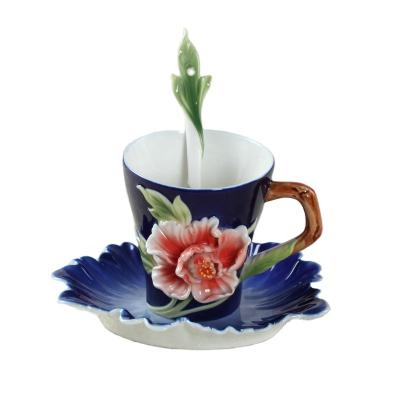 China Traditional 3D Flower Shape Ceramic Cup And Saucer With Spoon For Soldering Party Or Tea Time for sale