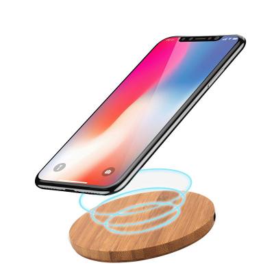 China Wooden Mobile Phone Tablet MP3 GPS Qi Wireless Charger Charging Pad for sale