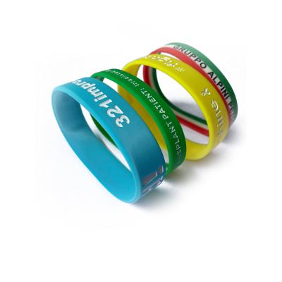 China Custom Eco - Friendly Europe Debossed Silicone Wristband For Sport for sale