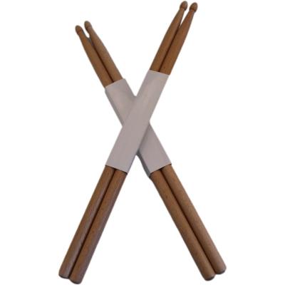 China Popular Wholesale Percussion Accessories 5A Drum Sticks Europe Natural Wood Beech Parts Drum Jazz Color Wooden Drumstick for sale