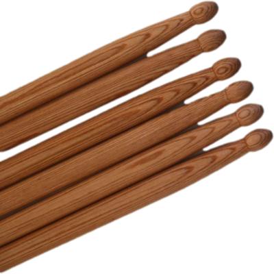 China Factory Promotion Small Popular Wholesale Red Drumstick Musical Instruments Technology Wooden Drumstick for sale