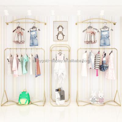 China Wall Mounted Clothing Store Gold Baby Dressing Rack Kids Clothes Stands Stainless Steel Kids Garment Shelves For Store for sale