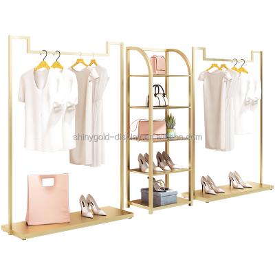 China Clothes Shop Custom Garment Rack Chrome Gold Clothing Rack Floor Standing Women Clothes Shop Display Rack Bag Rack for sale