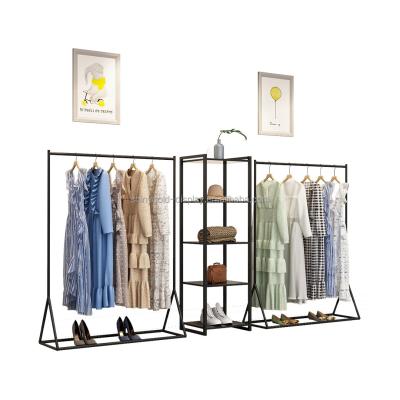 China Clothes shop retail clothing racks black clothes dress garment display rack for clothes for sale