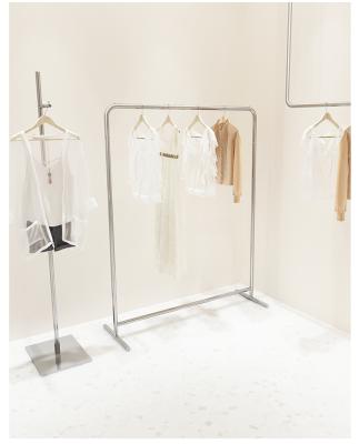 China Clothes Shop Modern Simple Metal Industrial Clothes Racks Pipe Stainless Steel Boutique Clothing Racks For Shops for sale