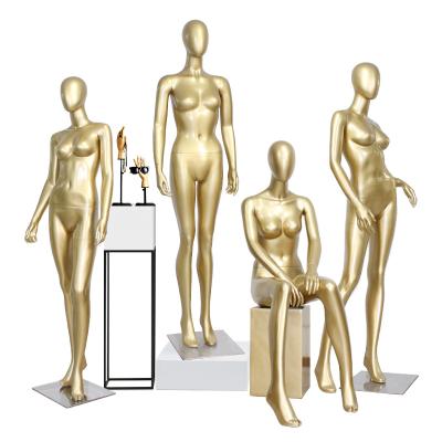 China For Clothing Show Fiberglass Metal Base Matt Gold Full Body Women Mannequins Female Model Clothing Store Display For Ladies for sale