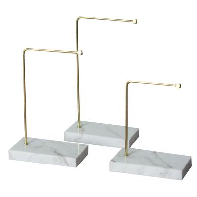 China Reusable Gold Earring Display Stand Jewelry Store Props Holders Marble Low Luxury Metal Hanging Jewelry Display Rack for sale