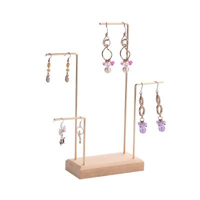 China Reusable Golden Metal Wire Jewelry Display Stand Jewelry Earring Holder With Wooden Base for sale