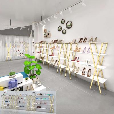 China Shops Store Showroom Design Shelves Shoes Display Stand Gold Metal Retail Clothing Show Shoe Rack Bag Display Stand for sale